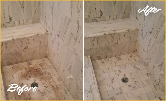 Before and After Picture of a Dirty Southington Marble Shower Cleaned to Eliminate Dark Stains