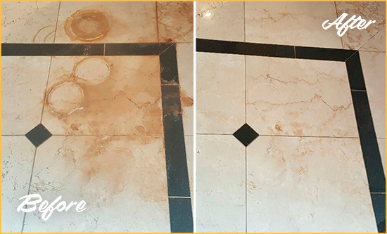 Before and After Picture of a Beacon Falls Marble Floor Cleaned to Eliminate Rust Stains