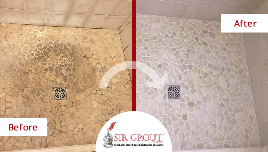 Before and After Picture of a River Rock Shower Floor Stone Cleaning Service in Cromwell, CT